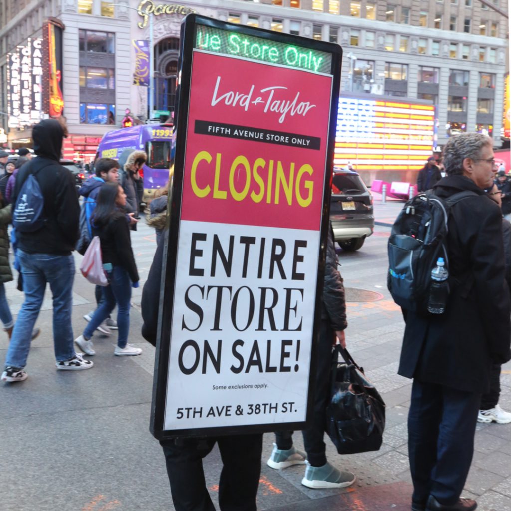 Sign spinners are a popular way to advertise special events like inventory liquidation sales.